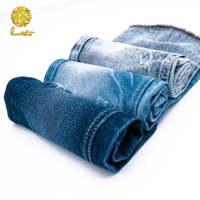 China Indigo Blue Denim Fabric Shrink-Resistant Colorful Jeans Denim Fabric for sale