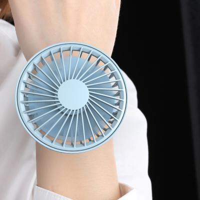 China 2021 New Small Portable Mini Fan Portable Pocket Wearable Watch Fan Wireless Wrist Watch Fan for Kids for sale