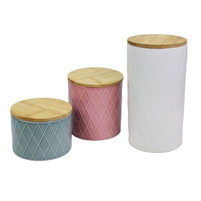 China Sustainable Mailbox Can Packing 3 Pc Embossed Canister Storage Jar Tea Pot Ceramic Herbs Container With Bamboo Lid for sale