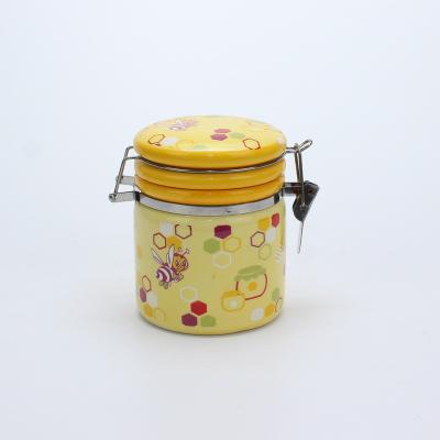 China Sustainable Honeycomb Texture Canisters Ceramic With Lids Bamboo Honey Bee Jar Canister With Airtight Lid for sale