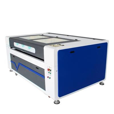 China 1390 water cooled laser engraving machine cutting and cnc lazer laser cutting machine for sale