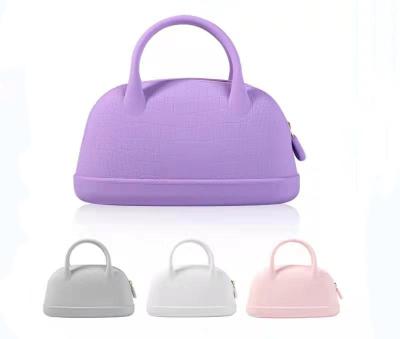 China Newest Fashion Top Handle Satchel Clips Waterproof Silicone Handbag Portable Makeup Bag For Women for sale