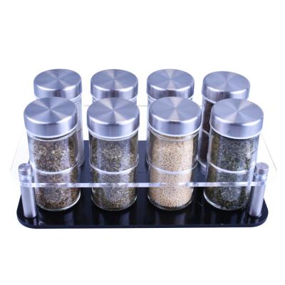 China Amazon Sustainable Hot Selling Kitchen Round Glass Spice Seasoning Bottles Set With Acrylic Holder for sale