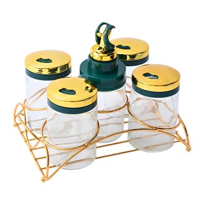 China New Design Household Kitchen 5pcs Spice Bottle Set Gold Seasoning Jar Viable Holder for sale