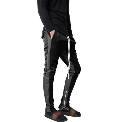 China OEM Logo Font Man Cheap Customizable Anti-Wrinkle Sports Stacked Joggers Pants With Side Pockets for sale