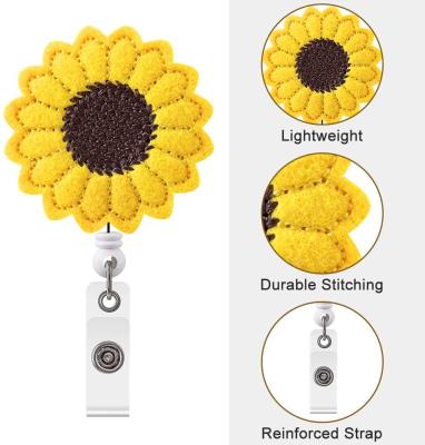 China Nurse Badge Holder Customized Multi Color Women Gift Clip Security Reinforced Strap Nurse Badge Holder Felt Sunflower Badge Reel for sale