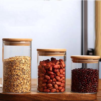 China Freshness Keeping Wide Mouth Round Borosilicate Bamboo Glass Jar Kitchen Food Spice Glass Storage Jar And Container With Bamboo Lid for sale