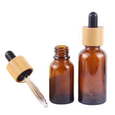 China ISO+BSCI Custom Cosmetic Glass Cosmetic Dropper Environmental Bamboo Bottle Empty Essential Oil Bottles for sale