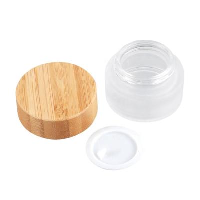 China Cosmetic Top Grade Matte Glass 20g Cream Jar With Airtight Lid Bamboo Cylinder Cream Jar for sale