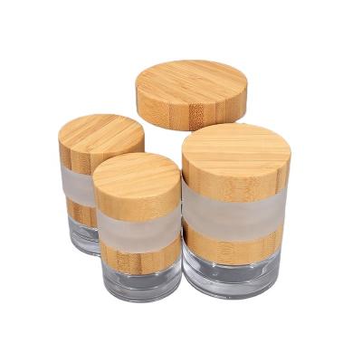 China 20g 30g 50g 100g Cute Amber Facial Clear Face Packing Cream Cosmetic Jar Cosmetic Frosted Glass Bottle With Natural Bamboo Lid for sale