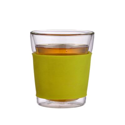 China Manufacturer Custom Colored Reusable Rubber Bracket High Borosilicate Glass Reusable Tea Cup for sale