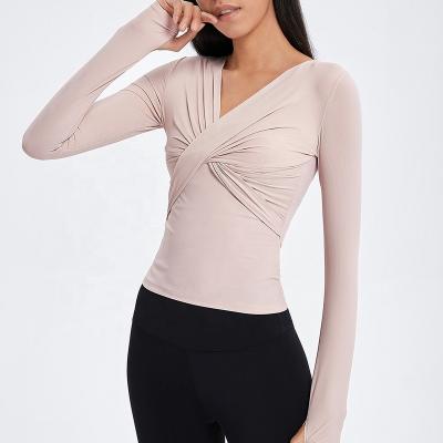 China Yoga Performance Wicking Moisture Ladies Compression Breathable Hot Selling Elastic Fitness Long Sleeve T-shirts Soft Athletic T-shirts for sale