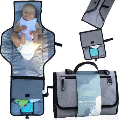 China Multi-Functional Purpose Pad Diaper Clutch Bag Station Portable Waterproof Lightweight Changing Compact Clutch Foldable 2 in 1 Changing Pad for sale