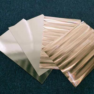 China Coated Food PET Transfer Laser Laminated Paper For Packaging Printing for sale