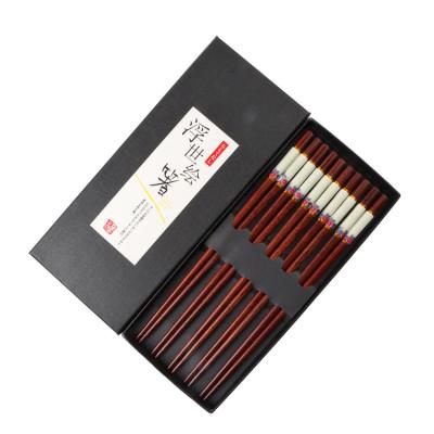 China Viable reusable plastic rich fish chopstick wooden milimalist drop five pair gift box tablewareset chopsticks for sale