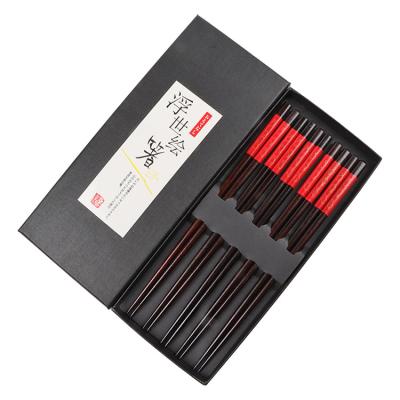 China Premium Viable Reusable Red Black Wooden Chopsticks Non-Slip Beginner Friendly Pairs Five Chopsticks A Box for sale