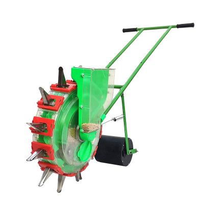 China Multifunctional factory hand push corn seeder price/manual grain planting machine for sale