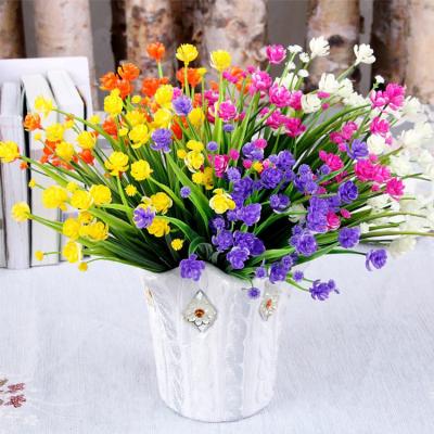 China Beautiful Artificial Flower Small Daffodil Plant Colorful Green Plastic Camellia Flowers Heads Spring Grass Artificial Lotus Flower For Home Garden Decor for sale