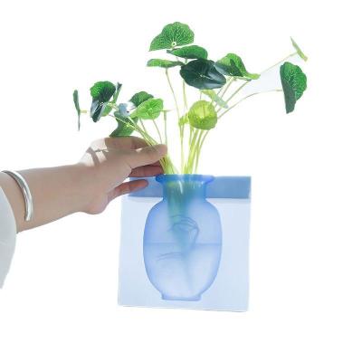 China Silicone Refrigerator Paste Flower Pot Eco-friendly Sticky Vase Hanging Decorative Reusable Wall Mounted Magic Flower Vase for sale