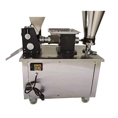 China Can make many styles of 110v/220v small size commercial food dumpling empanda making machine/automatic dumpling machine/dumplings maker for sale