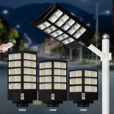 China ROAD 2023 high lumen with remote control outdoor waterproof built-in sensor Smd 180w 240w 300w all in one led solar street light for sale