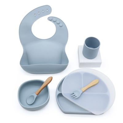 China Sustainable Silicone Feeding Set Bamboo Wooden Bowl Silicone Baby Spoon And Flat Fork Toddler Children for sale