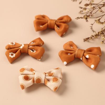 China Hot Selling Insti Wholesale Children's Jewelry Retro Style Bowknot Children's Hairpin Girls Clip Side Children's Accessories for sale