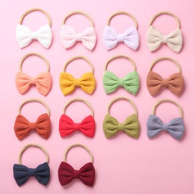 China Super soft ruffled baby headband cotton muslin cotton bow tie baby headband nylon soft ruffled headdress for sale