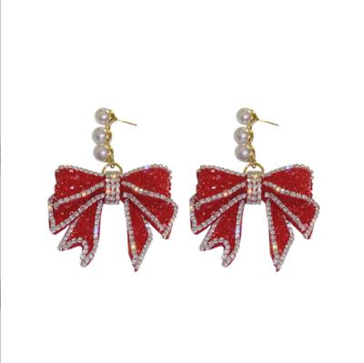 China RETRO Christmas 925 Red Exaggerated Diamond Bow Knot Pearl Earrings Silver Needle Earrings Women New for sale