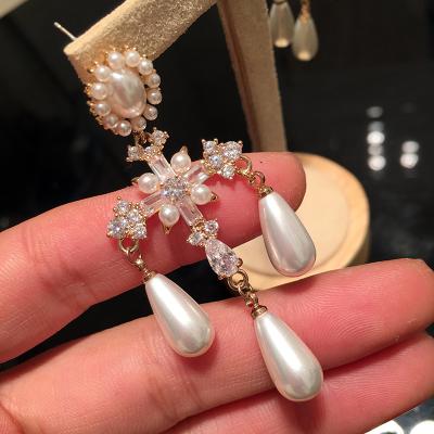 China Retro Vintage Temperament Love Cross Bead Female Cross Tassel Earrings Long Dangling Earrings Earrings for sale