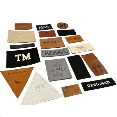 China Sustainable Apparel Labels Manufacturer Custom Logo Embossed Real Genuine Leather Patches For Hats for sale