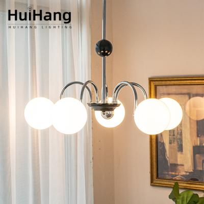 China HUIHANG OEM minimalist living room modern custom spherical brass pendant lamp dining room led modern pendant lights for sale