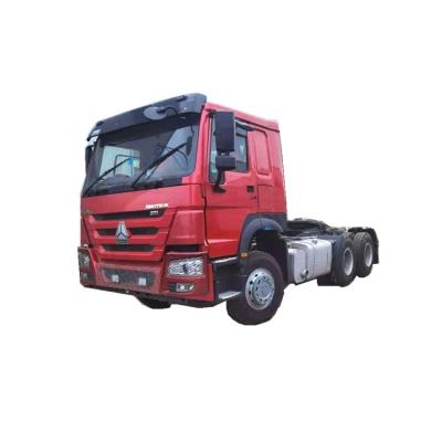 China Hot Selling Sinotruck Howo 6x4 Tractor Truck Germany Yellow Sheet Germany Gray Engine Gross Wheel Color Red White Double Long Cloth Cab for sale