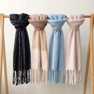 China Autumn Winter Thick Whip Tassel American Thick Scarf All-match Plain Yarn Buckle European Solid Tassel Scarf for sale