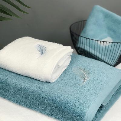 China Wholesale Sustainable 100% Bamboo Fiber Polyester Cotton Hotel Embroidered Hand Towel Hotel White Bath Towels Face Tissue Towel for sale