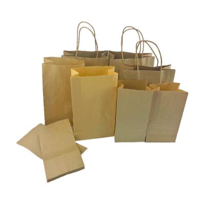 China Recycled Materials custom logo shopping food reusable wholesale custom kraft paper bag with handles for sale