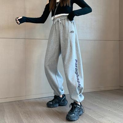 China Anti-wrinkle 2021 spring women fashion streetwear pants elastic high waist drawstring letters print female long pants trousers for sale