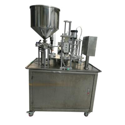 China Automatic High Quality Stainless Steel Rotary Cup Certificate Beverage CE Filling Sealing Machine for sale