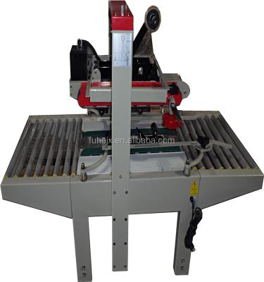 China FXJ-5050 GARMENT Top and Bottom Drive Automatic Box Carton Sealer for sale