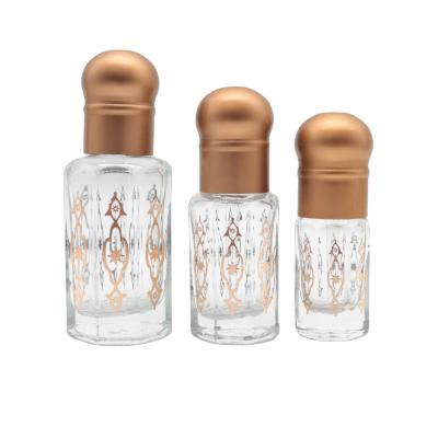 China With Wholesale 3ml 6ml 12ml Glass Empty Copper Stick Glass Bottle Octagonal Arabian Essence Bottle With Glass Stick for sale