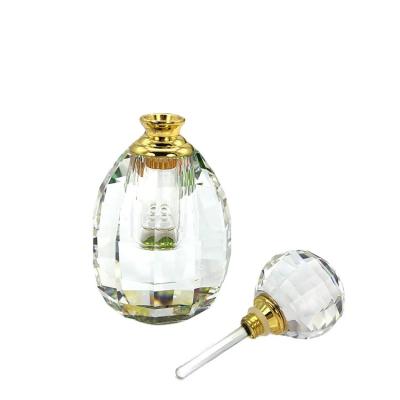 China Crystal Promotional good quality glass bottle with transparent cap bottle essence oud glass bottle for sale