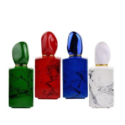 China Personal care best selling 50ml glass bottle wholesale glass perfume bottle for men and woman customizd logo for sale