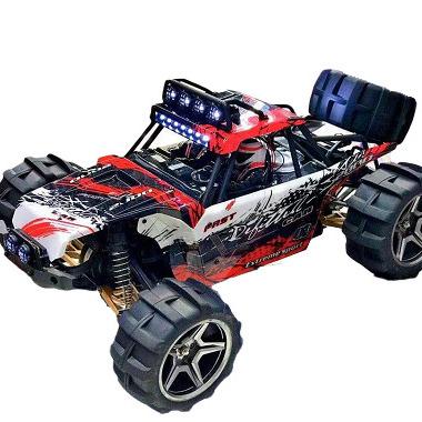 China 12409 RC Hobby 12409 1:12 Electric Remote Control Vehicle Off-Road Desert 4WD Suspension Riding High-speed Die-casting Vehicle Toy for sale