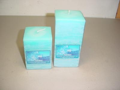 China 100% paraffin wax scented square pillar candle with clear wrapping and printed label for sale