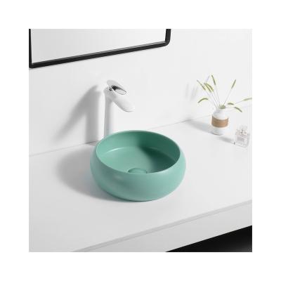 China Modern Bathroom Furniture Light Luxury Luxury Apartment Countertops Modern Ceramic Hand Fired Light Green Sink for sale