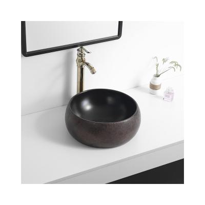 China Art Deluxe Countertop Sink Modern Ceramic Fired Bathroom Vessel Sink for sale