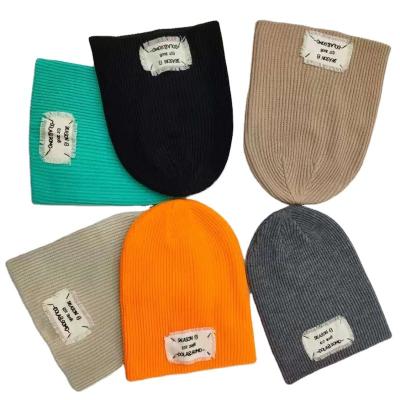 China COMMON Hot Sell Beanies Knitted Beanie Hats /Wholesale Acrylic Winter Knitted Beanie Hat for sale