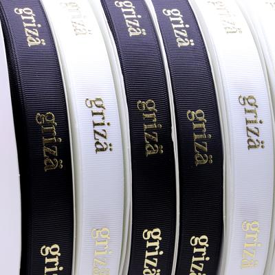 China Recyled Customized 25 Inch 3D Printed Black White Logo 1 Mm Raised Embossed Gold Foil Grosgrain Satin Ribbon For Gift Package for sale