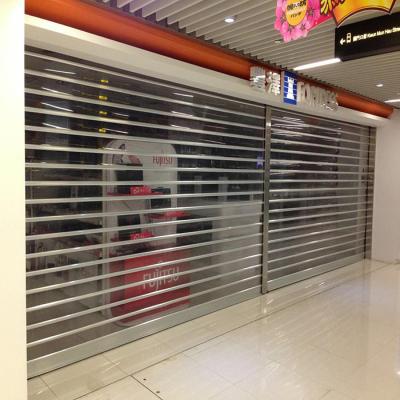 China Waterproof Polycarbonate Store High Transparent Commercial Central Main Entrance Automatic Rolling Door for sale