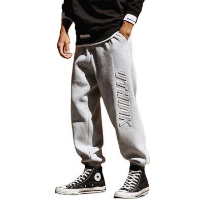 China Anti-wrinkle Custom Plain Drawstring 3d Embossed Logo Fleece Sweatpants Baggy Soft Jogger Sweat Pants For Men for sale